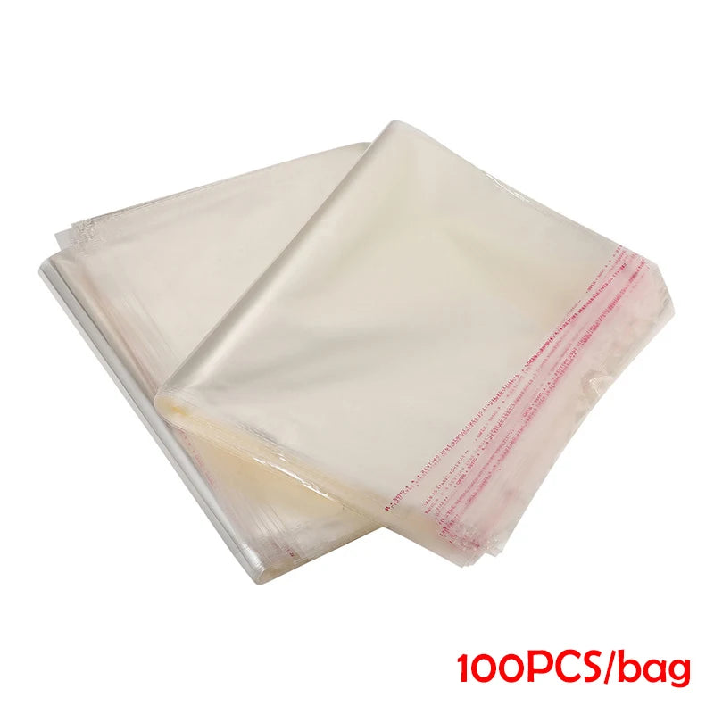 100pcs Poly Transparent Bag Opp Self Adhesive Plastic Bag For T Shirt Clothes Packaging Clear Storage Bag Wedding Gift Packaging