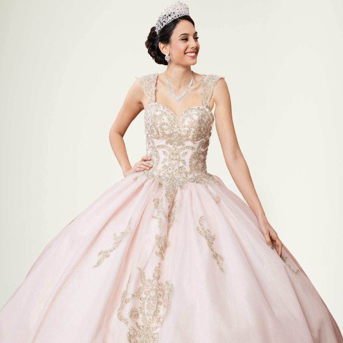 A beautiful gown, off-shoulder, reveals noble air.