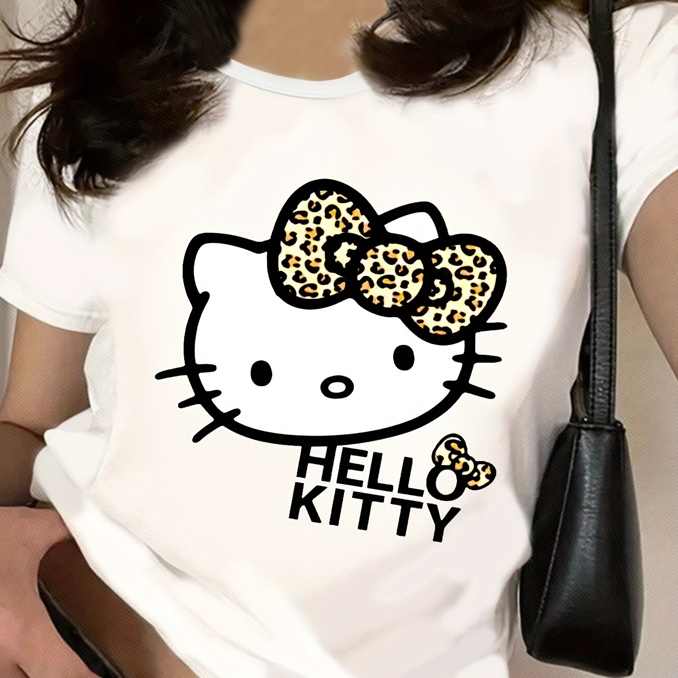 Sanrio Hello Kitty Leopard Print Bow Cute Cartoon Graphic Women's T-Shirt - White Casual Round Neck Tee for Spring/Summer, Soft Polyester Blend, Machine Washable, Everyday Tee | Cartoon Print Top | Hello Kitty Design, Sanrio